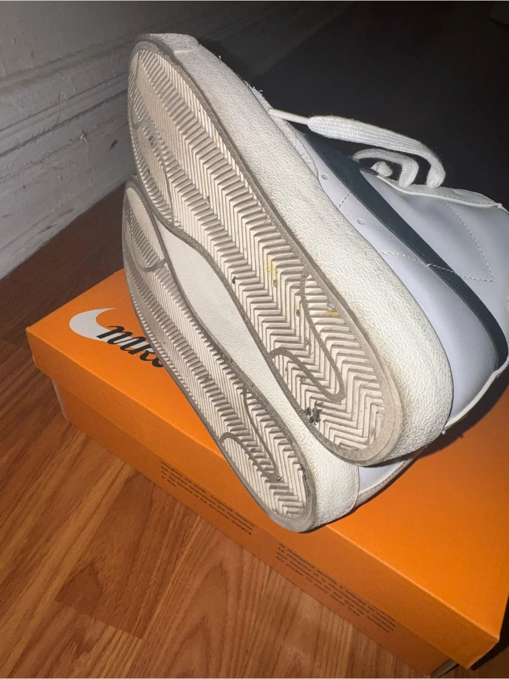 Nike Blazer Mid '77 white sneakers with black Nike swoosh